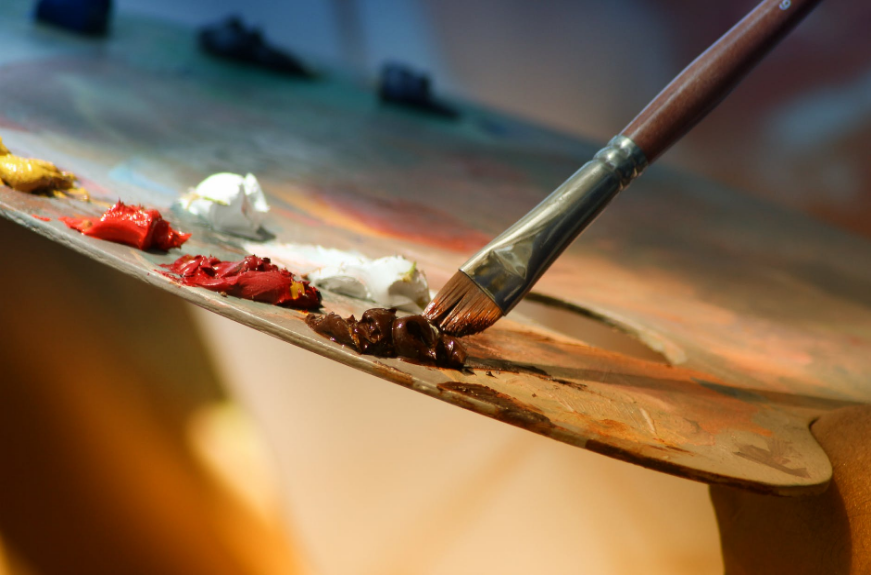 a brush and oil paint